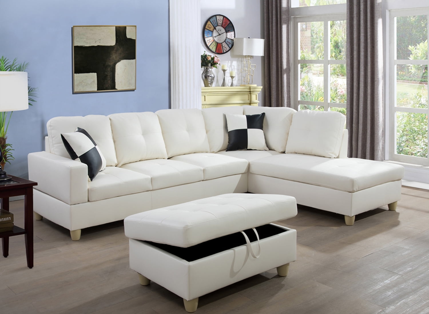 white leather sofa and ottomans