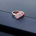 thumbnail image 3 of Gem Stone King 18K Rose Gold Plated Silver Swiss Blue Topaz and Pink Moissanite and White Created Sapphire Engagement Ring for Women (0.89 Cttw, Gemstone November Birthstone, Heart Shape 4MM, Size 7), 3 of 4