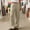 Khaki, variant on Tqcoqu Wide Leg Palazzo Pants for Women Casual Loose Drawstring Trendy Beach Linen Trousers with Pockets Vacation,Brown,Women's S-XXXL