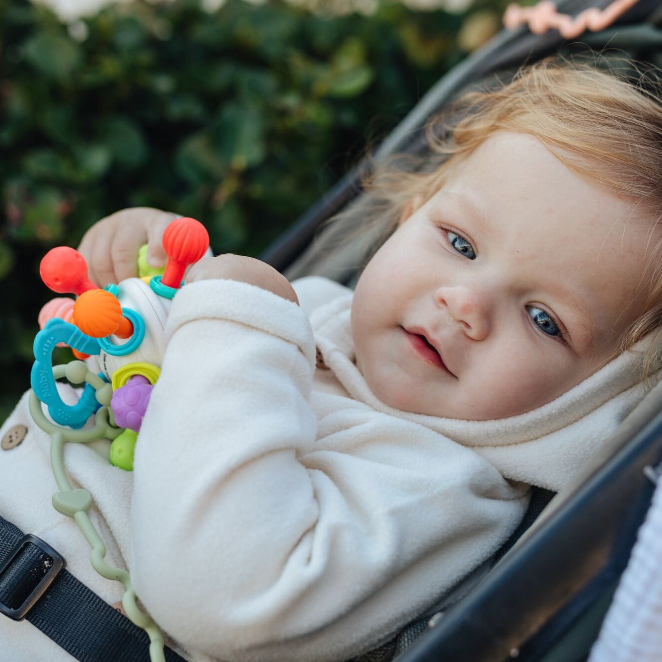 Nuby Textured Twist Ball Baby Teether Infant Toy with Colorful Rattle