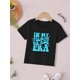 thumbnail image 2 of Youngsters' Casual Short Sleeve T-Shirt - iN MY FouRTH GRaDe eRa Graphic Print, Black with Blue Lettering, Machine Washable Summer Top for Back to School & Playdates, 2 of 6