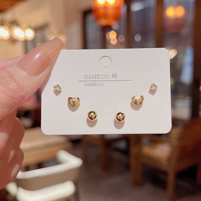 S925 Aguja de plata Exquisito traje de oreja de circón Pequeño pendiente de botón Ligero de lujo Nicho Todo fósforo Elegantes pendientes de perlas Pendientes de mujer