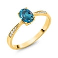 thumbnail image 2 of Gem Stone King 10K Yellow Gold London Blue Topaz and White Diamond Engagement Ring for Women (1.06 Cttw, Gemstone November Birthstone, Oval 7X5MM, Available in Size 5, 6, 7, 8, 9), 2 of 5