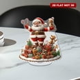 thumbnail image 5 of Rotating acrylic ornament featuring a bespectacled Santa on a gift pile with candy canes and squirrels in vibrant surrealist details and warm colors, 5 of 8