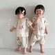 thumbnail image 5 of Conjunto de pijamas de verano para bebés de 0 a 5 años, ropa de descanso con estampado bonito, Top de manga corta + Pantalones cortos, ropa informal para el hogar para niños y niñas de 2 uds., 5 of 6