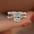 thumbnail image 2 of Divine Creation Women's 2.15 Ct Oval Cut White Diamond Christmas Thanksgiving Engagement Bridal Ring Set 14K Rose Gold Plated 925 Sterling Silver -6, 2 of 3