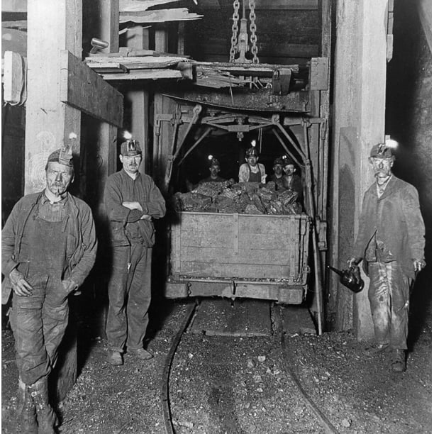 Pennsylvania Coal Miners. /Nminers And A Car Full Of Coal In An Coal