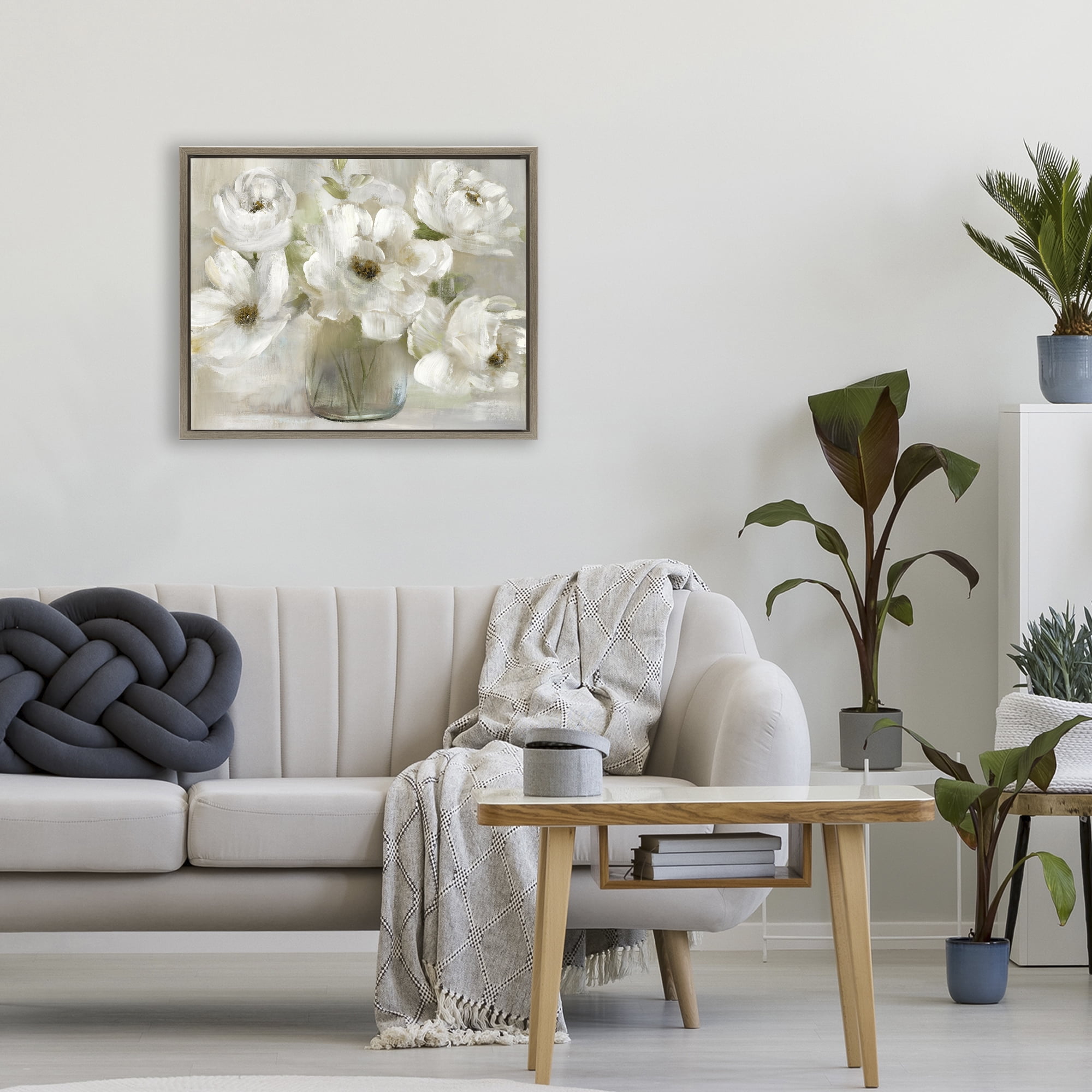 Stupell Industries Gentle White Petals in Vase Brown Framed Floater Canvas Wall Art, design by Nan