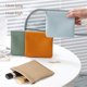 thumbnail image 2 of Mini bolsa de cosméticos portátil de cuero popular, pequeña bolsa de almacenamiento con cojín de aire para lápiz labial, bolsa para auriculares, artículos diversos, 2 of 6
