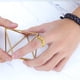 thumbnail image 3 of Anillo giratorio de acero inoxidable oso de fresa para la ansiedad Sol Luna Estrellas Oro 7#, 3 of 6