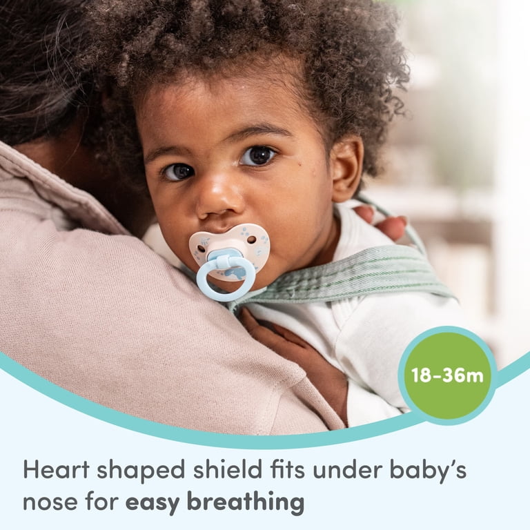 NUK First Choice Classic Day & Night Tétines pour bébé | 0-6 mois | Sucettes orthodontiques qui brillent dans le noir | 95% d'acceptation par les bébés** | Assorti | Lot de 4