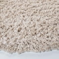 thumbnail image 4 of SAFAVIEH August Sophia Solid Shag Area Rug, Beige, 6'7" x 6'7" Round, 4 of 8