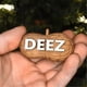 thumbnail image 2 of Adorno de árbol de Navidad Deez Nuts, adornos colgantes navideños con forma de cacahuete sarcástico Deez Nuts para decoración divertida para fiesta de Navidad, regalo de broma, 1 pieza, 2 of 5