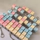 thumbnail image 5 of Llavero con botón y tecla - Diseño de teclado DIY, colores macarrón, suave sonido de clic, antiestrés, regalo de bolsillo para todas las edades, 5 of 5
