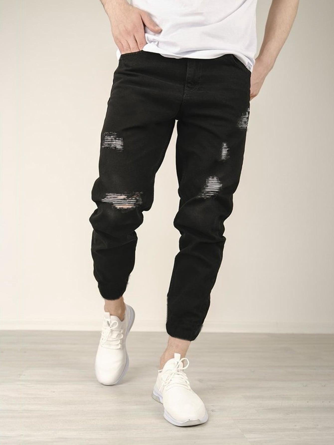 Men Ripped Raw Trim Jogger Jeans 