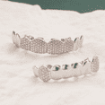 thumbnail image 5 of Copper Zirconia Vampire Fang Grillz Set, Gold & Silver Tone Iced Teeth Caps with Dense Stone Arrangement, Hip Hop Party Dental Jewelry for Men & Women, 5 of 6