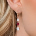 thumbnail image 3 of Gem Stone King 18K Rose Gold Plated Silver White Moissanite 3 Stone Dangle Earrings for Women (5.60 Cttw, Gemstone Birthstone, Oval 8X6MM, 7X5MM and 6X4MM), 3 of 6