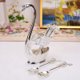 thumbnail image 1 of Elegante y moderno juego de cucharas con base decorativa (1 base y 6 cucharas). Ideal como adorno de mesa o regalo., 1 of 6