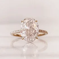 3Ct Oval Cut Lab Created Diamond Women's Halo Engagement Ring 14K Yellow Gold Plated