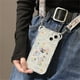 thumbnail image 2 of Estuche con cordón cruzado con orejas de oso y flor bonita coreana para iPhone 14 13 12 11 Pro XS Max X XR 7 8 Plus, funda blanda a prueba de golpes con correa Tan Jianjun unisex, 2 of 2