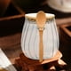 thumbnail image 5 of Tarro de vidrio para guardar té con cuchara: recipiente hermético para hojas de té, especias y hierbas, vidrio transparente, diseño moderno, organizador para encimera de cocina., 5 of 5