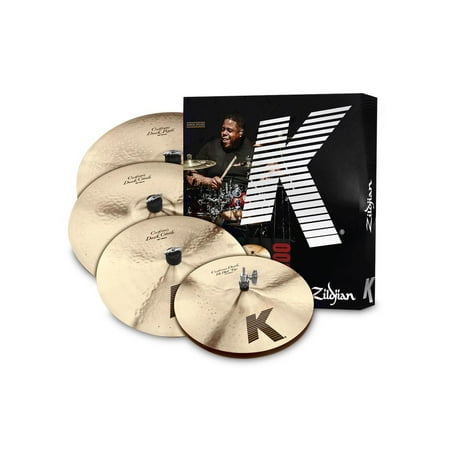 Zildjian K Custom Dark Cymbal Set K Custom Dark cymbals are known for their warm  rich sound that cuts through and sings out. Overhammering on top of the cymbal provides slightly dry  trashy overtones. This pack is comprised of the most popular sizes within the K Custom Dark lineup. Features: 14  Hi-Hats 16  & 18  Dark Crashes 20  Ride Traditional Finish Made in the U.S.A. Get your Zildjian K Custom Dark Cymbal Set today at the guaranteed lowest price from Sam Ash with our 45-day return and 60-day price protection policy.