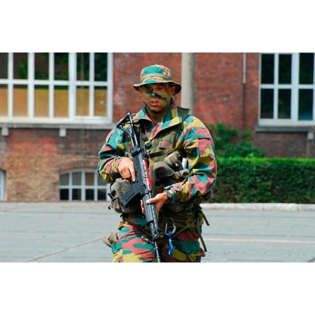 A paratrooper of the Belgian Army during a training session in assault techniques and handling his FN FNC rifle Poster Print by Luc De JaegerStocktrek (Best Assault Rifle Ever)