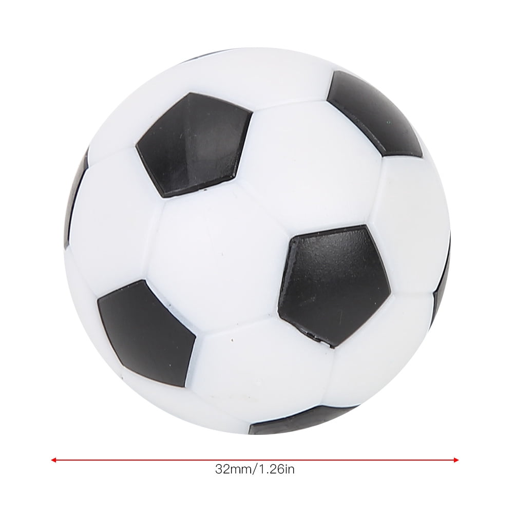 Un groupe de ballons de football noirs et blancs photo – Football Photo