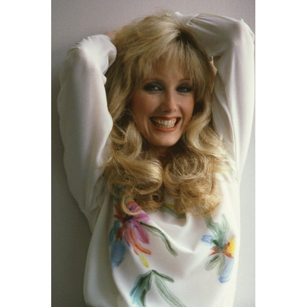 Morgan Fairchild Smiling Portrai Tin White Sweater Arms Above Head Morgan Fairchild Smiling Portrai Tin