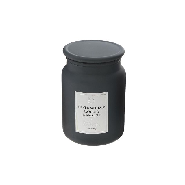 Matte black 19 oz scented candle in a glass jar with silver label reading Silver Mohair and matching lid.