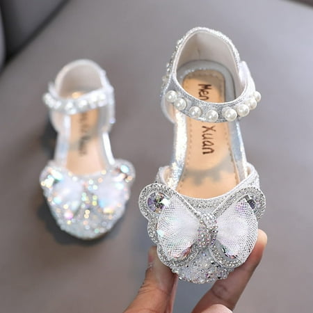 

Kuegmeu Girls Dress Shoes Closed Toe Low Heels Ankle Strap Bow Ballet Wedding Party Sandals Comfy Soft Sole Non-slip Princess Flower Shoes Silver 14