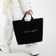 thumbnail image 1 of Bolso tote grande para mujer, ideal para el trabajo y los desplazamientos diarios | Bolso shopper informal y versátil con estampado de letras, 1 of 6