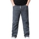 thumbnail image 1 of Pantalones de Cintura Elástica para Hombre Color Sólido Negocios Jeans de Denim Casual con Bolsillos, Pantalones de Ajuste Suelto Recto, Poliéster Spandex, 1 of 9