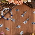 thumbnail image 3 of 1 caja de 50 crucifijos vintage de plata y esmalte azul, con forma ovalada, para Pascua., 3 of 5