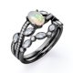 thumbnail image 4 of JeenMata Anillo de Bodas con Bisel en Forma de Chevron, Pavé Infinito de Canal de Moissanita y Ópalo Welo Ovalado de 1,75 Quilates, Engastado en Oro Negro de 18 K sobre Plata, 4 of 6