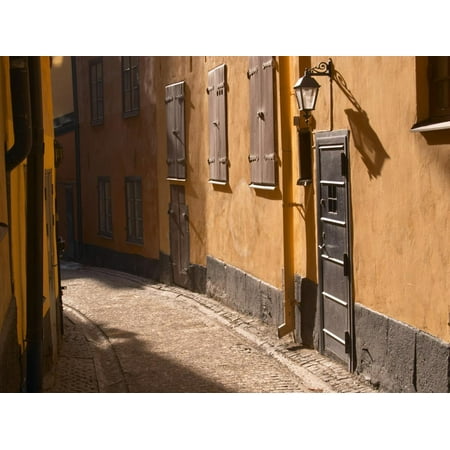 Swedish Iron Wall - Cobblestone Street in Gamla Stan, Iron Cellar Door and Old Lamp, Stockholm, Sweden Print Wall Art By Per Karlsson
