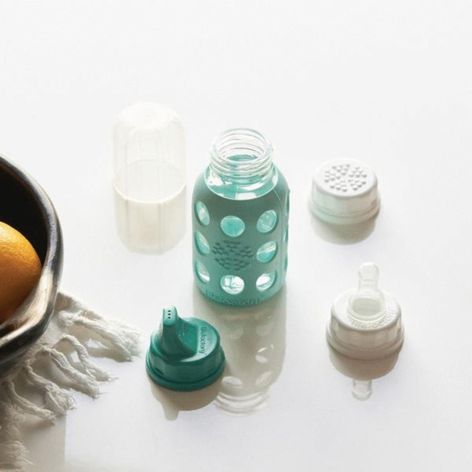Lifefactory 6 Bottle Starter Set (4) 4-Ounce Baby Bottle in Mint/Blanket (2) 9-Ounce Baby Bottle in Kale/Blueberry (2) Flat Caps (2) Sippy Caps (2) Stage 2 Nipples, Mint/Blanket/Kale/Blueberry/White
