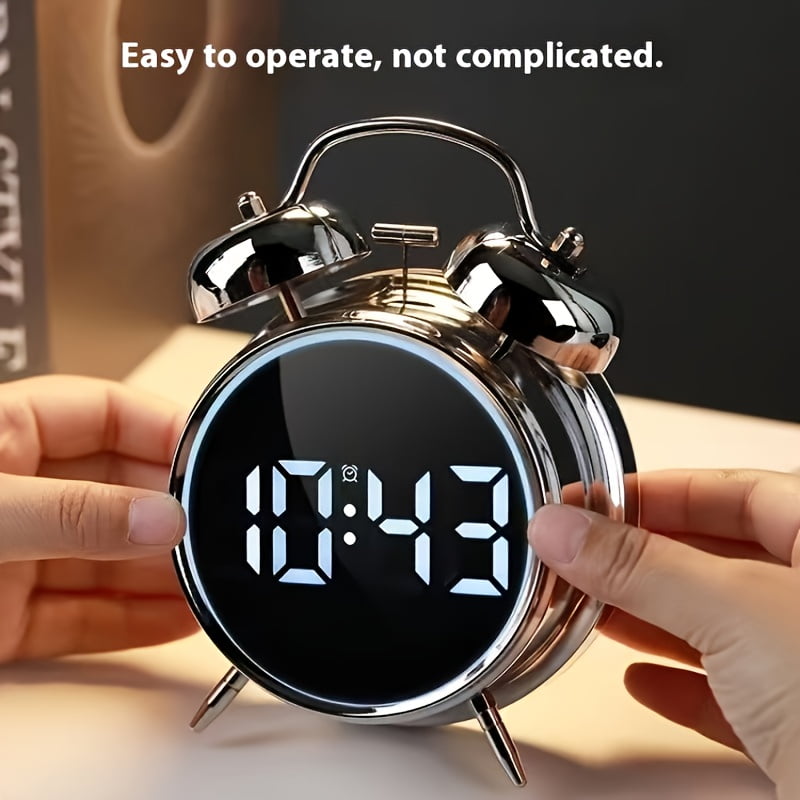 This is a stylish metal alarm clock with a night light and a variety of features, including temperature and date displays. It operates quietly without ticking and has both weekday and weekend alarm s