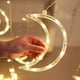 thumbnail image 5 of Galactic Symphony: cortina de luces con forma de luna y estrellas, resistente al agua y controlada de forma remota, de alto brillo, adecuada para lugares dispersos, decoración interior y exterior, 5 of 5