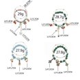 thumbnail image 3 of Juego de 2 pulseras con dijes navideños para mujer y niña, pulsera de cuentas elásticas navideñas, muñeco de nieve, copo de nieve, ciervo, Papá Noel, árbol de Navidad, 3 of 4