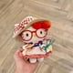 thumbnail image 1 of hello Cartoon Red Glasses Apron Keychain Plush Toy Backpack Doll Plush Keychain for Women Style 29, 1 of 2