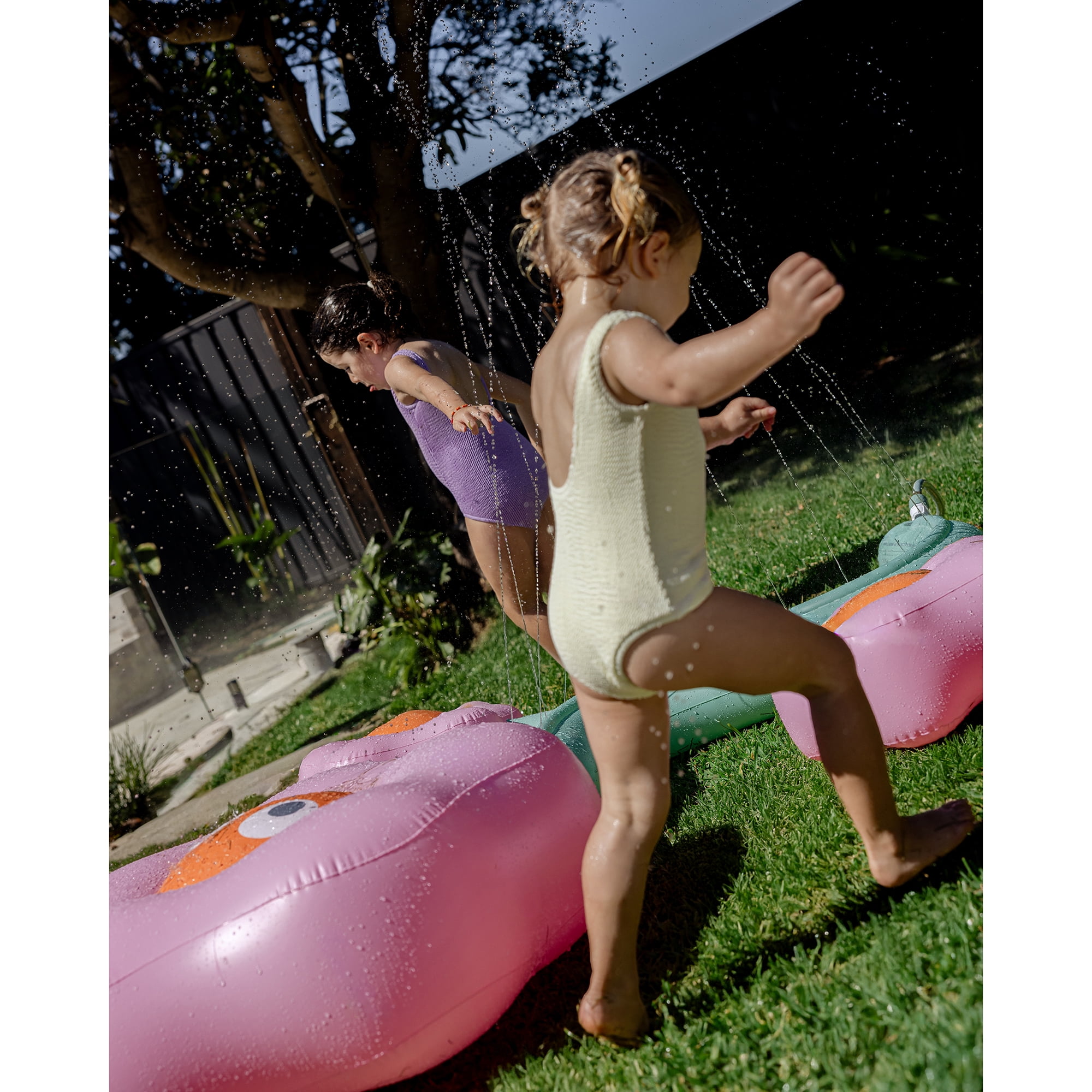 Sunnylife: Inflatable Sprinkler - Poppy the Peach - 88" Pink-Orange Character Flower Shaped Water Sprayer, Ground Lay-Flat Design, Kids Outdoor Play