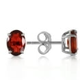 thumbnail image 1 of Galaxy Gold 14k White Gold Oval-Shaped Garnet Stud Earrings, 1 of 3