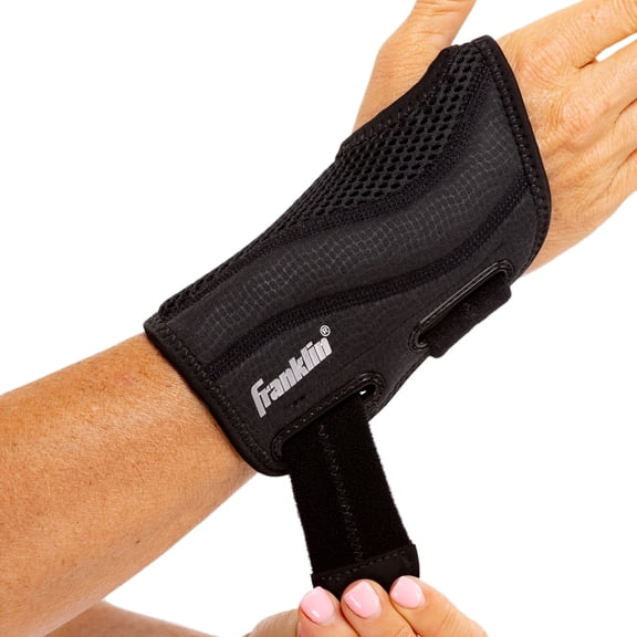 Franklin Sports Wrist Brace and Stabilizer - Adjustable Sports Wrist Guard - Wrist Compression Brace for Pain Relief   Injury Prevention - One Size