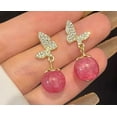thumbnail image 2 of Clip on 1 1/4" gold butterfly and pink bead earrings w/clear stones, 2 of 4