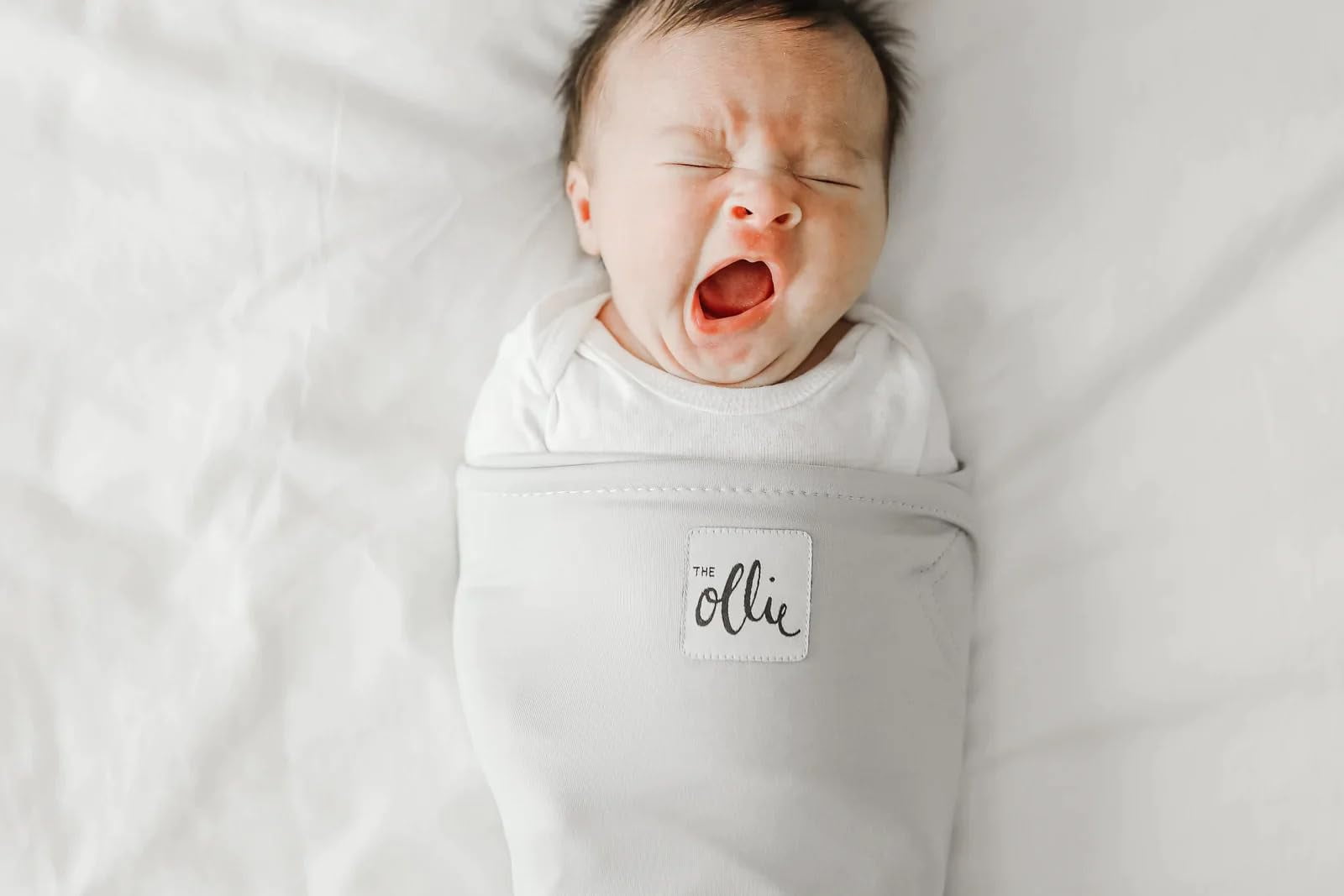 The Ollie Swaddle -- Helps to reduce the Moro (startle) reflex -- Made from a custom designed moisture-wicking material (Stone)