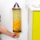 thumbnail image 1 of Injueey Cilindro portátil para colgar en la pared, soporte para bolsa de basura que ahorra espacio, organizador, dispensador, accesorios de cocina Almacenamiento y organización del hogar amarillo Injueey HA026114-02, 1 of 1