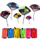 thumbnail image 2 of Juguete de paracaídas de 6 piezas, paracaídas de juguete para lanzar sin enredos, juguetes voladores para niños al aire libre, regalos (6 colores) brillar  Electrónica, 2 of 5