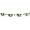 thumbnail image 2 of Gem Stone King 925 Sterling Silver Green Peridot and White Moissanite Tennis Bracelet for Women (6.91 Cttw, Gemstone Birthstone, Oval 6X4MM, 7.5 inch), 2 of 5