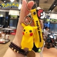 thumbnail image 1 of LLavero de dibujos animados de silicona tridimensional Pokemon Pikachu pequeño dragón de fuego lindo pareja colgante pequeño regalo portátil., 1 of 5